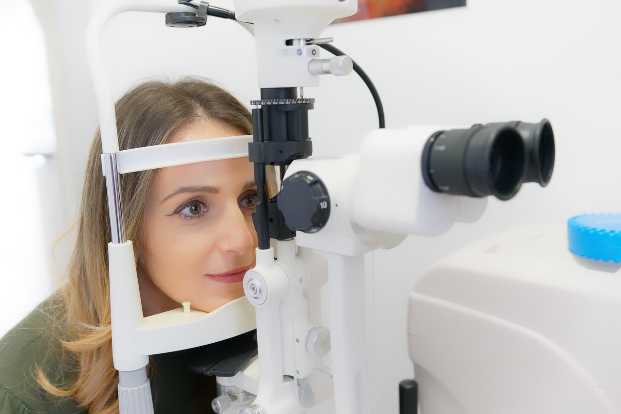 Mobile optometrist setting up portable eye-test equipment at a patient's home in Australia